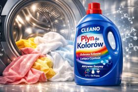 Butelka płynu do prania kolorowych tkanin obok pralki z kolorowymi ręcznikami